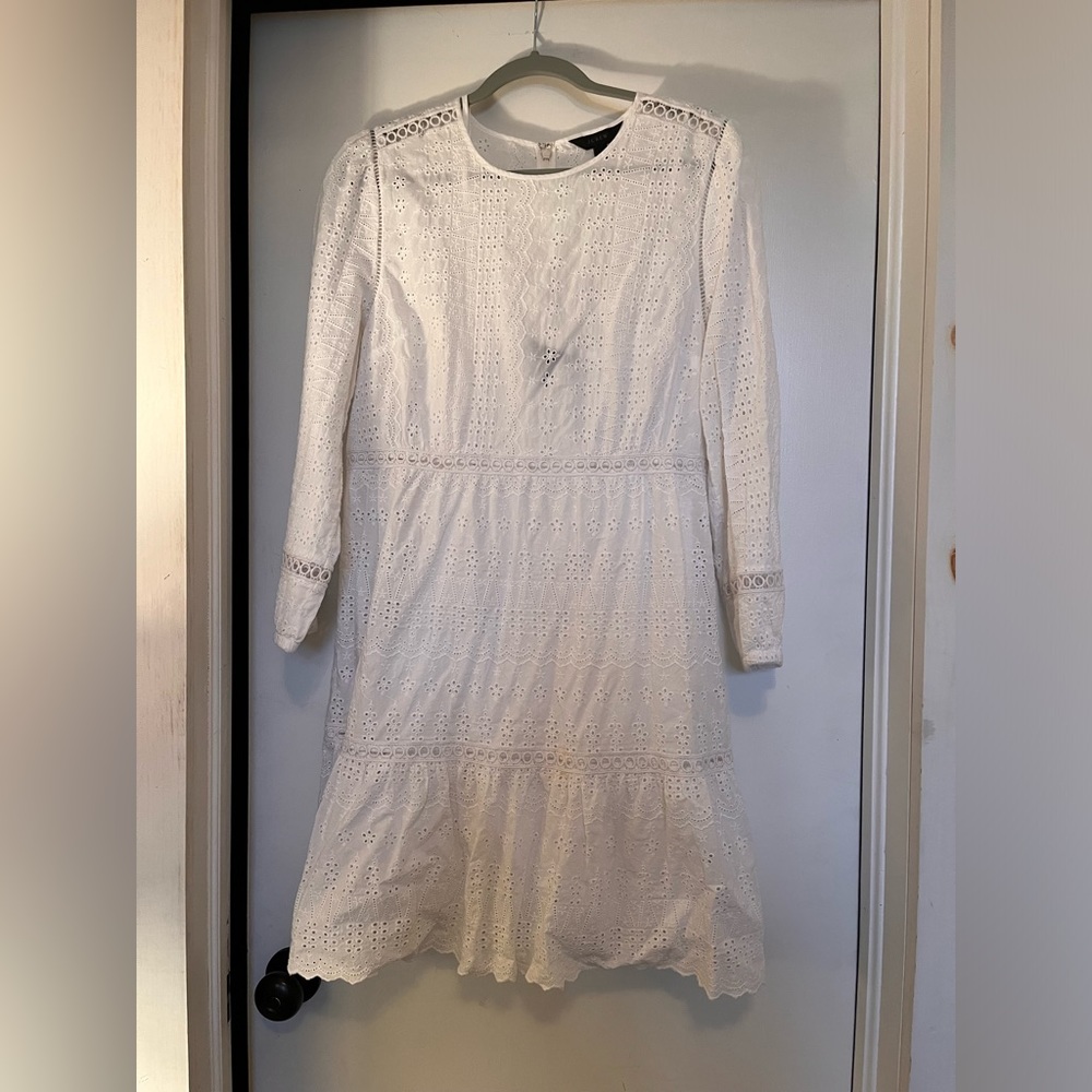 White eyelet dress. Super cute with puff sleeve and fitted waist.